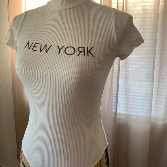 White Shortsleeved Bodysuit. Size small - Picture 2 of 3